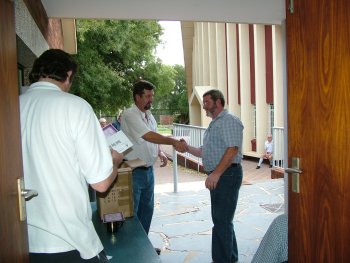 Reinhard, Molkentin Stud, collects his prizes and is thanked by Corrie van Staden (left)