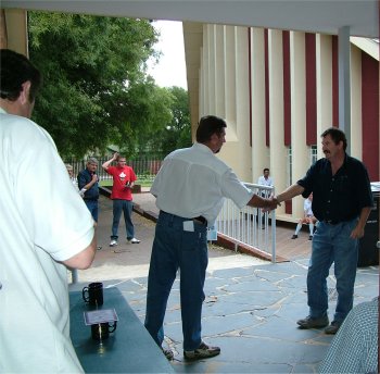 Ian Bleasdale, Best Bird on Show, collects his prizes and is thanked by Corrie van Staden (left)