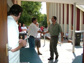 Pierre Swart, one of the judges being thanked by Corrie van Staden (left)