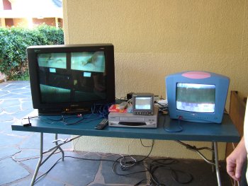 Signal from Cam Judge on TV left. Security cameras displayed on monitor on the right.