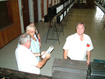 George Sutton Judging while Gert Pieters and John Grobler assist.