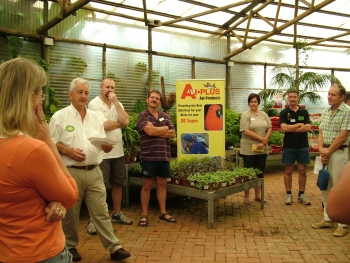 Les opens the show surrounded by fanciers from various clubs. AVI Plus sponsored prizes at the show. From left are Jenny Meyer, Les Weyers, Ian Nel, Smartryk Burger, The Grobbelaar Stud and Dave Oldknow.