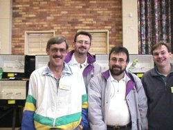 Jacaranda Show Budgie Society members attending the show. (L to R) Pieter van der Linde, Ian Nel, John Nel, and Russel Dixon.