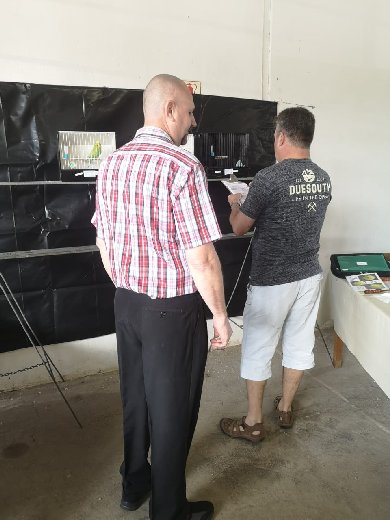 Ian Nel (left) busy judging