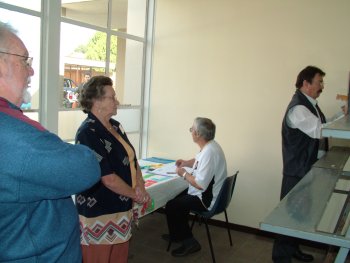 Craigh Kenton, Val Nagel look on as Ian Bleasdale judges. Mike Cooper (Senior Steward) in background