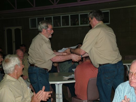 Reinhard Molkentin accepting his awards at the prize giving from Andre Scholtz - Free State Rare and Spangle Show 2015