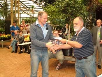 Dave Oldknow receives his awards from Mike Davies