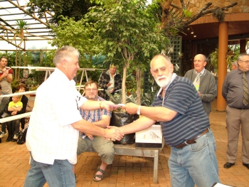 Dup Stud receives his awards from Mike Davies