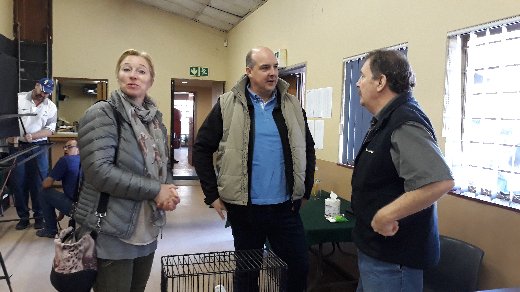 Frank Nietgen (middle) chatting to Ian Bleasdale (left) with Frank's wife looking on.