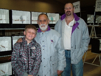 Mike Davies and his grandson with Ian Nel