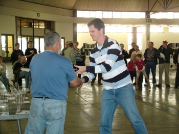 Deon Davie collects his prizes