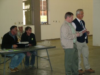 The members of the Cage Bird Society busy with the prize giving