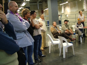 Roy does the welcome while the exhibitors look on