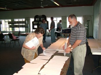 Val Nagel and Mike Davies sort the catalogue