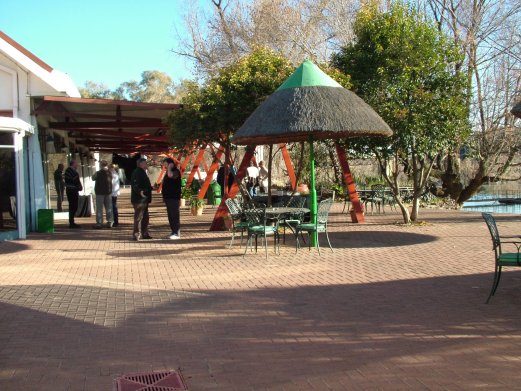 The Maselspoort venue on the left. The patio area before the river.