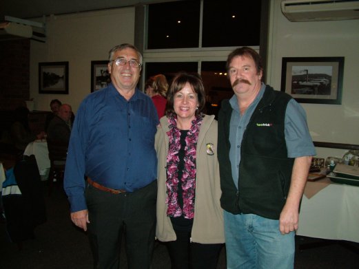 Malcolm Taylor and Ian Bleasdale accept the Bleasdale, Taylor and Wright Challenge Certificate for Best Light Green, Best Opaline Grey Green, Best Opaline Grey and Best Opaline Cinnamon Blue Series on Show from Elke de Witt.