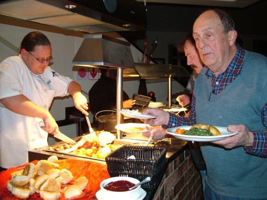 Supper is served. Heino Artus and Ian Bleasdale make their selection.