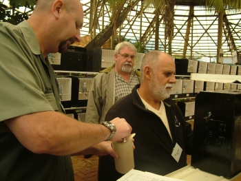 Ian Nel assisting the Judge Mike Davies while Gert Pieters looks on