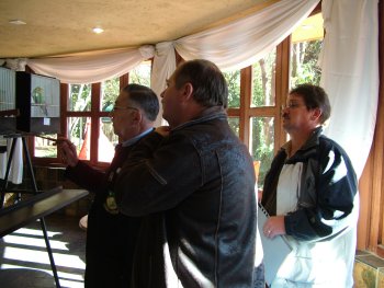 Chris Oberholzer judges while senior steward, Smartryk Burger (right) looks on. Tom Lynch in foreground.