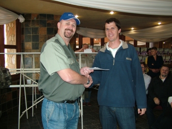 Deon Davie collects his prizes for Best Bird on Show